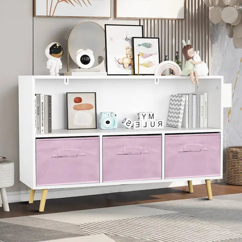 Meuble de rangement en bois blanc, gris et rose avec tiroirs en tissu et étagère ouverte